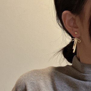 925 Sterling Silver Textured Bow Earring 40400128 925 Sterling Silver Textured Bow Earring 40400128