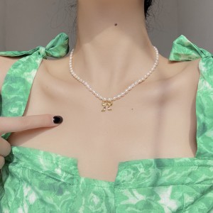 925 Sterling Silver Fresh Water Pearl Bow Pendant Necklace 80200436